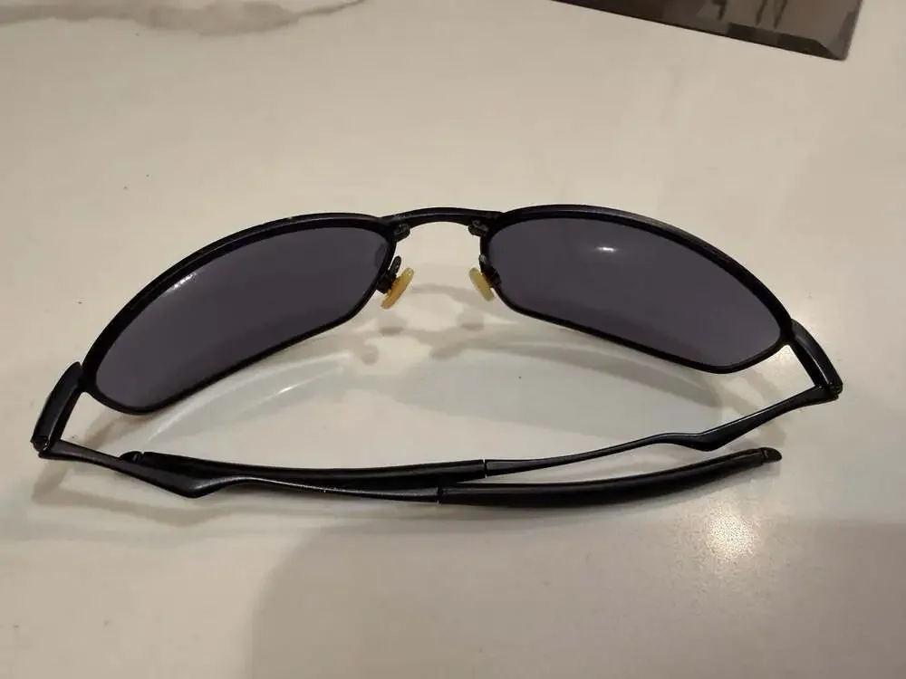 Oakley Whisker Metal Black Oval Sunglasses